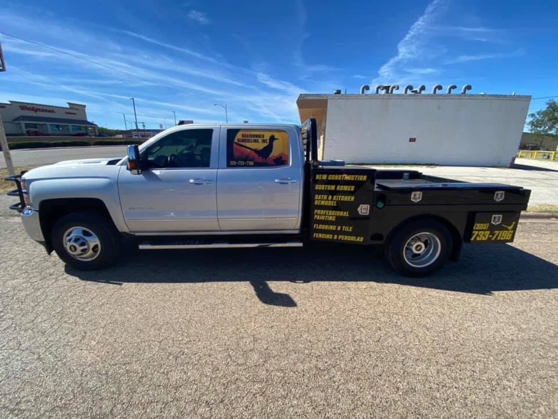 Roadrunner Remodeling branded work truck at a local project.